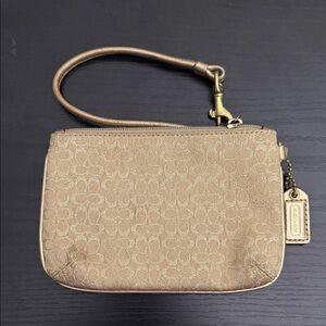 Coach Gold Wristlet with Signature Pattern